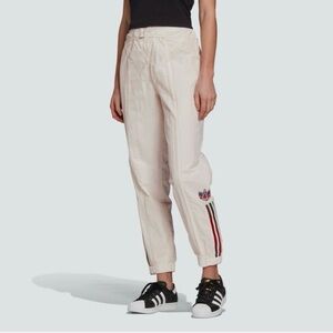 Adidas x Paolina Russo Off-White Track Pants with rainbow gradient stripes